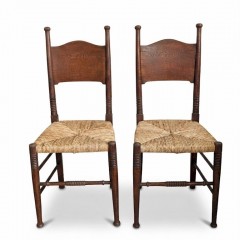 Pair of arts and crafts chairs by William Birch