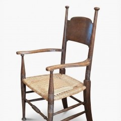 Arts and crafts elbow chair in oak William Birch