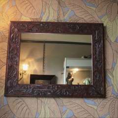 Arts and crafts carved mirror in mahogany