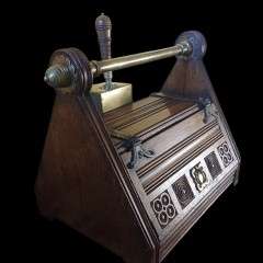 Christopher Dresser oak fireside scuttle