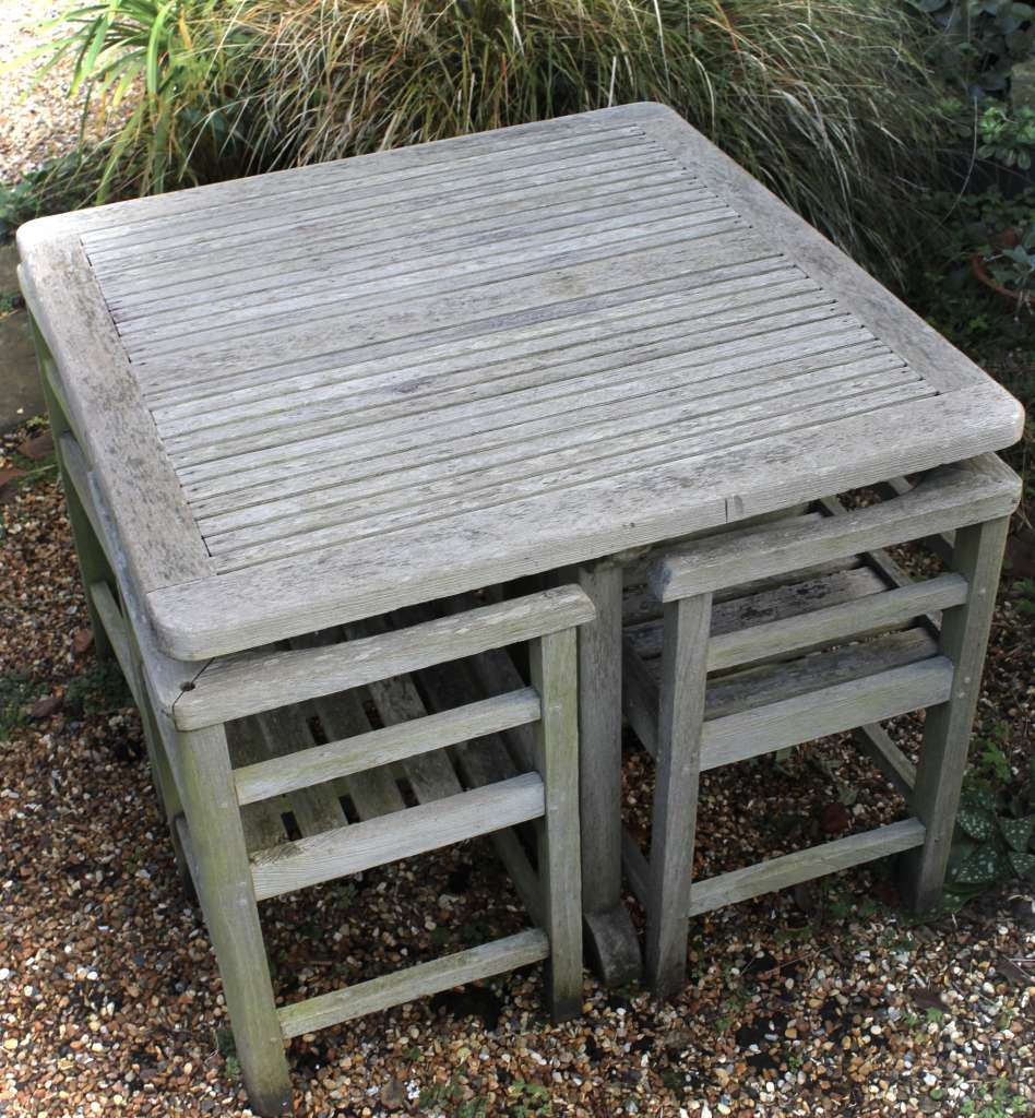 Weathered teak garden set retailed through Heals