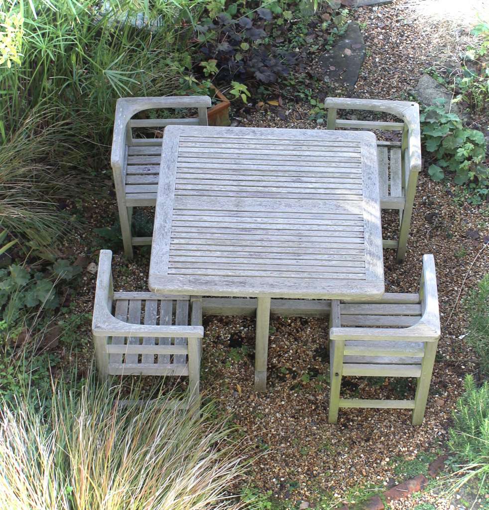 Weathered teak garden set retailed through Heals