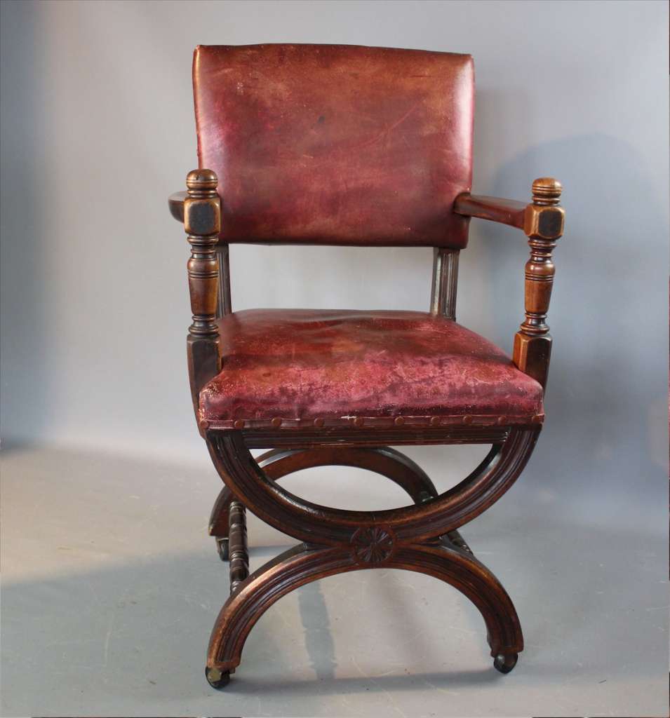 Victorian X framed mahogany and leather chair